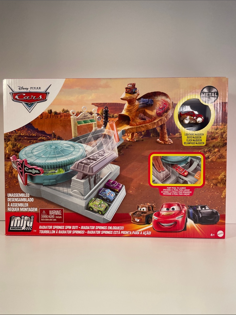 Mini Racers Radiator Springs Spin Out Playset-Dents in cardboard packaging